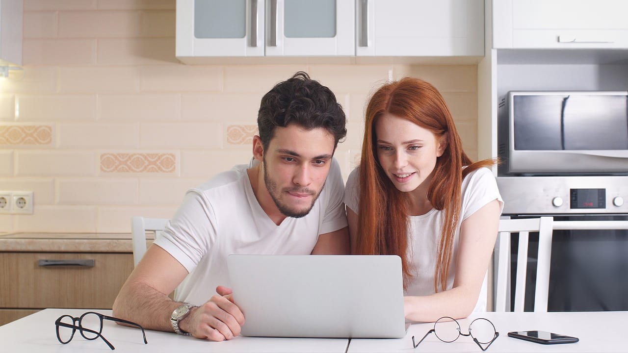 Couple and Laptop